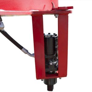 Ram pilot auger drills holes in hard ground